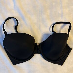 Victoria’s Secret lined Demi 34DD/F75 black bra thin comfortable, gold accent V